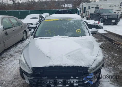 2015 Ford Focus Titanium from USA, damaged, VIN 1FADP3J27FL333002